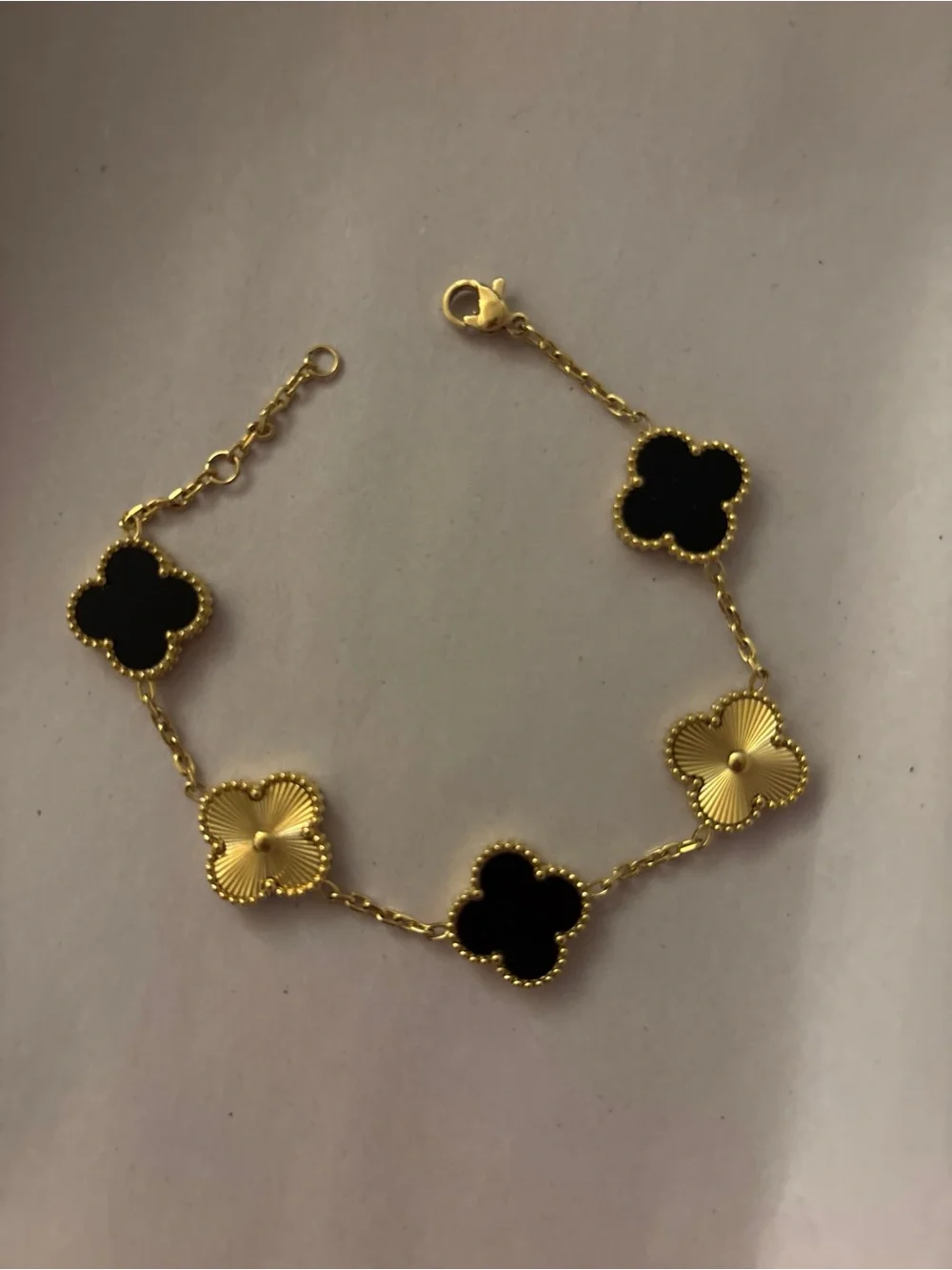 Fashion Jewelry Gold-Tone Bracelet with Black Clover Motifs